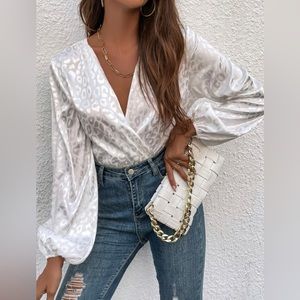 White leopard bodysuit